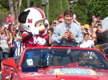 MVP Eli Manning at the Magic Kingdom in 2012, with Mickey Mouse