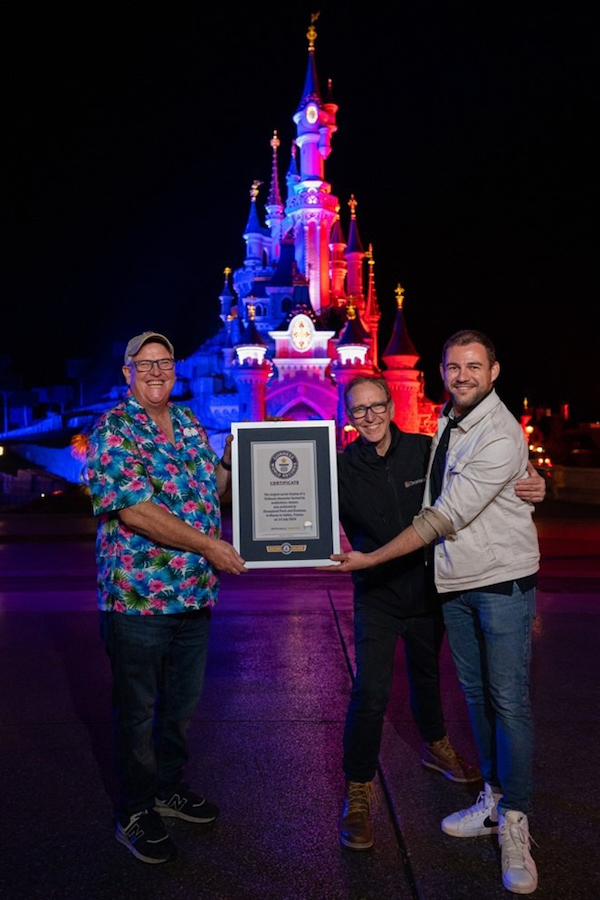 Ben Spalding and Matthieu Robin accept Guinness World Record award at Disneyland Paris