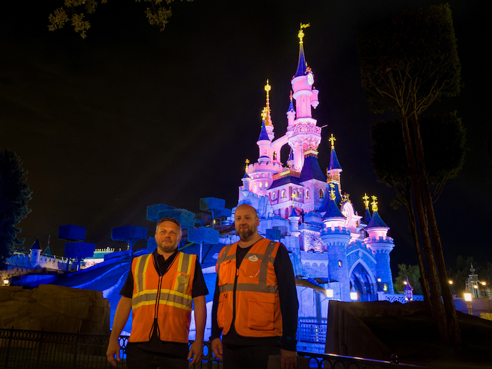 Sleeping Beauty Castle at Disneyland Paris at night with Imagineers