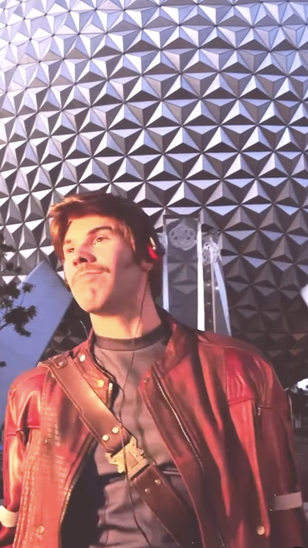 Star-Lord in Front of Spaceship Earth