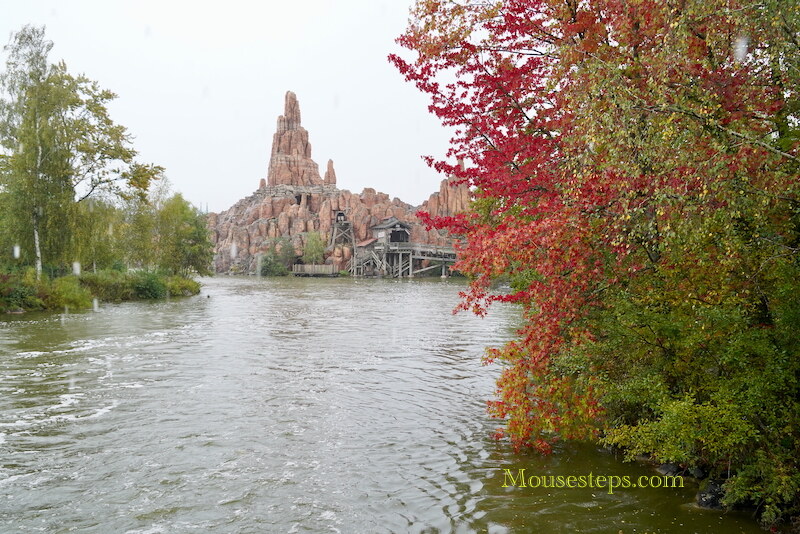 Big Thunder Mountain with fall leaves in foreground at Disneyland Paris