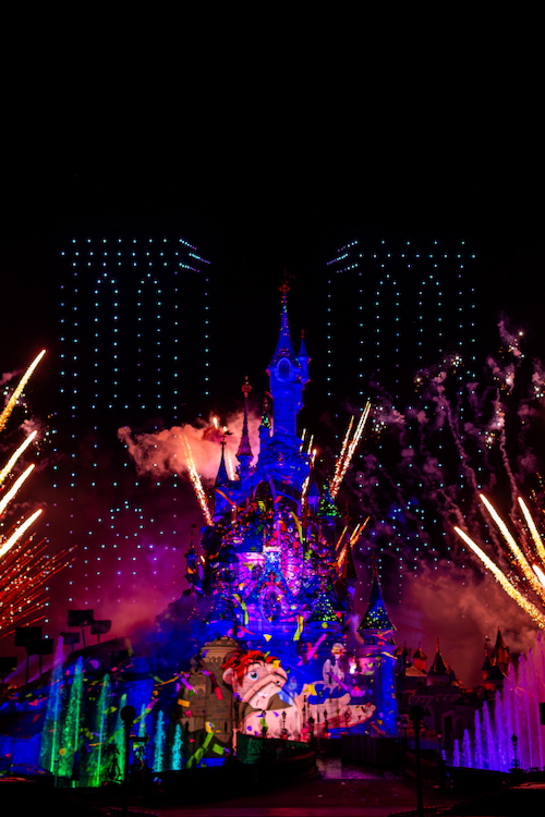 The Hunchback on Sleeping Beauty Castle with Fireworks