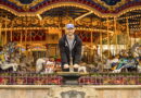 Actor Chris Evans Raising the Sword in the Stone at Magic Kingdom